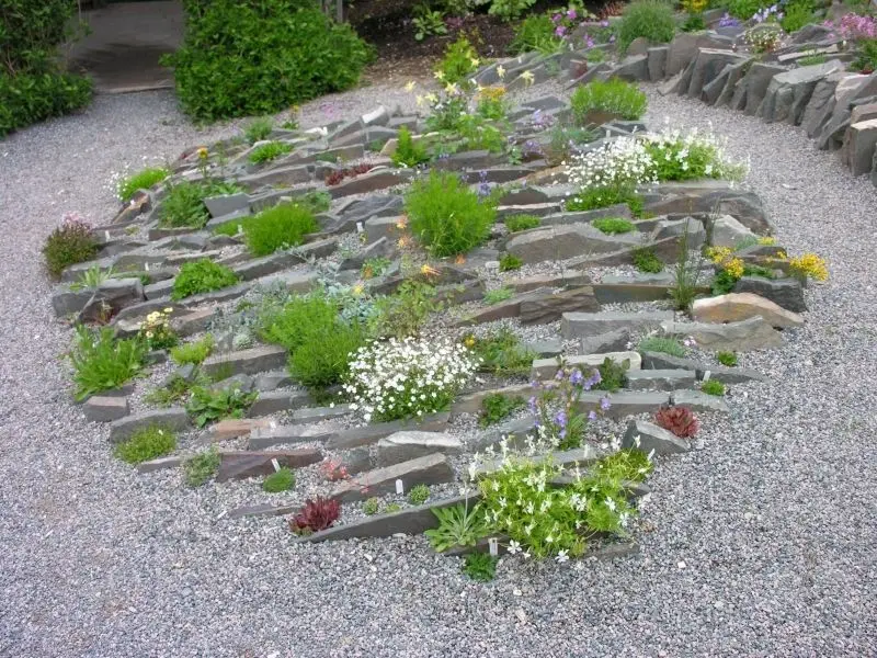 The beautiful natural rockery combined with trees creates an ideal relaxing space.